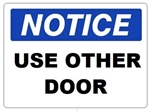 NOTICE USE OTHER DOOR Sign - Choose 7 X 10 - 10 X 14, Self Adhesive Vinyl, Plastic or Aluminum.